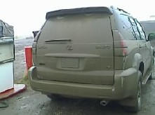 Our SUV encrusted with Arctic mud